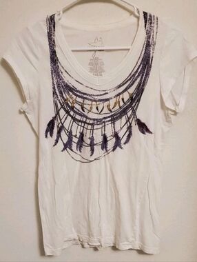 Miley Cyrus And Max Azria White V-Neck Tee with Purple Feather Necklace Print
